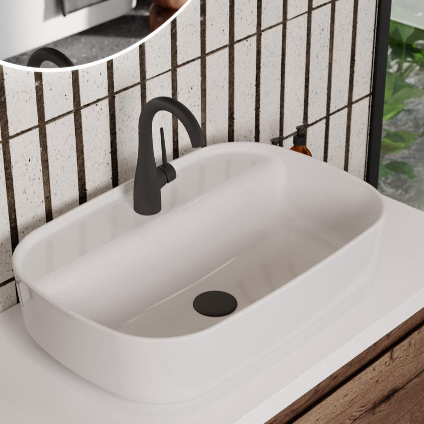 Eden, tall matt black basin mixer tap with swivel spout